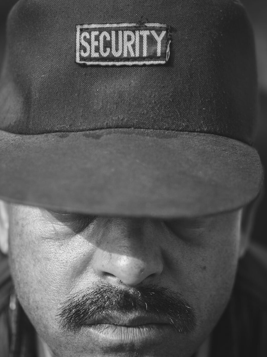 A uniformed Nobel Security Group officer on duty